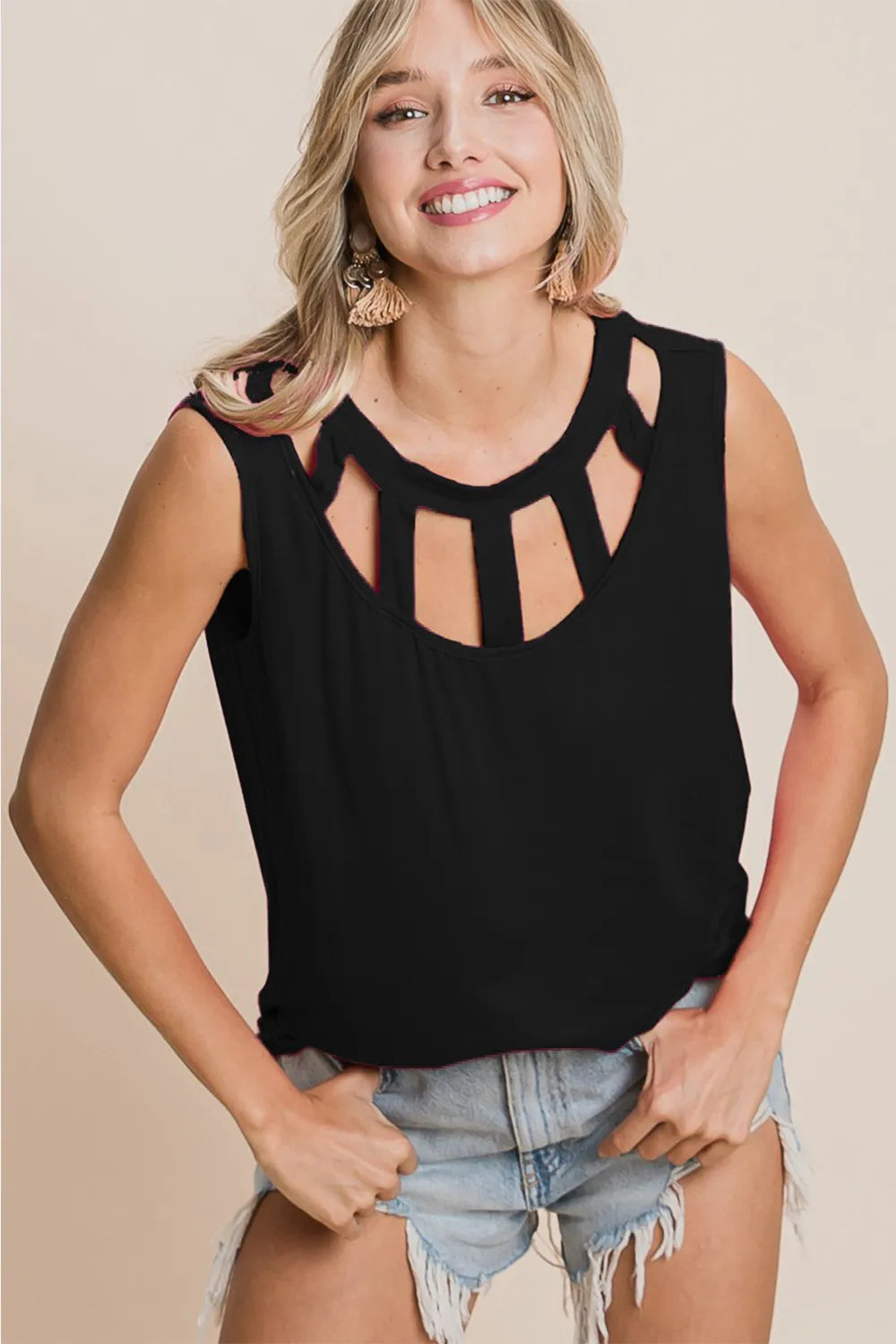 Trendsi BiBi sleeveless round neck top with cutout detail, showcasing a stylish, fitted design in a soft fabric.