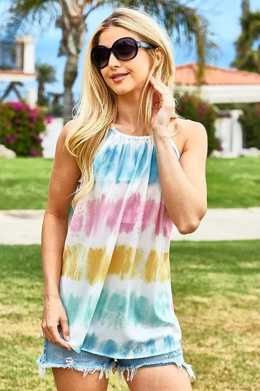 Colorful BiBi tie-dye halter neck top with adjustable straps, featuring a trendy, vibrant design and sleeveless style.