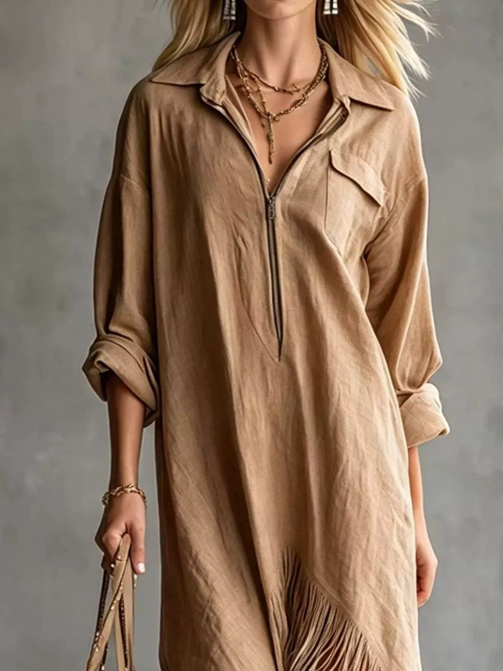 Trendsi fringe hem zip-up shirt dress featuring a stylish front zipper and decorative fringe detail at the hem.