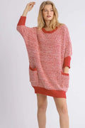 Plus size Umgee ribbed hem round neck sweater dress with 3/4 sleeves and pockets, featuring a cozy knit texture.