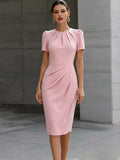Ruched short sleeve midi dress by Trendsi featuring a fitted silhouette and stylish design, shown in a flattering view.