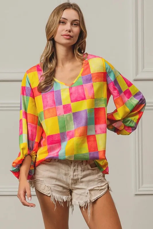 Colorful BiBi Multi Block Bubble Pop Balloon top featuring vibrant bubble designs, stylish and playful for casual wear.