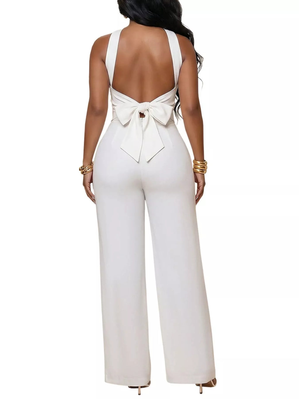 Backless twist top and wide-leg pants set by Trendsi, featuring a stylish backless design and flowy wide-leg trousers.
