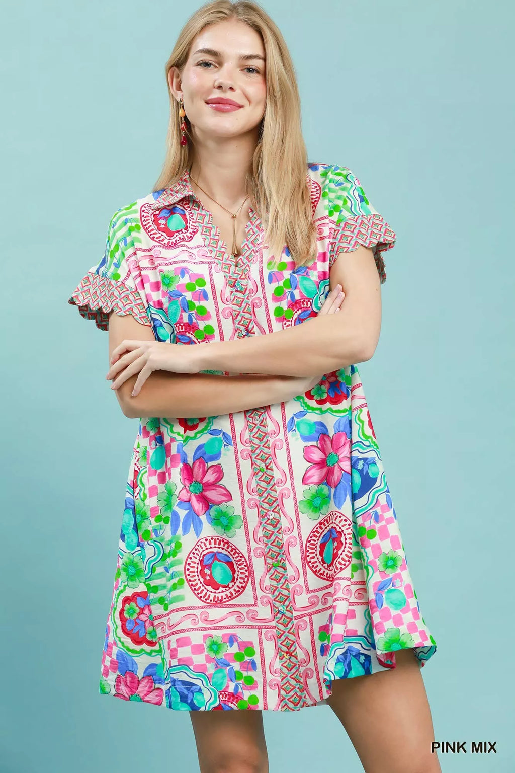 Umgee Mediterranean print dress with contrast printed trim, featuring a flowy silhouette and vibrant, intricate patterns.