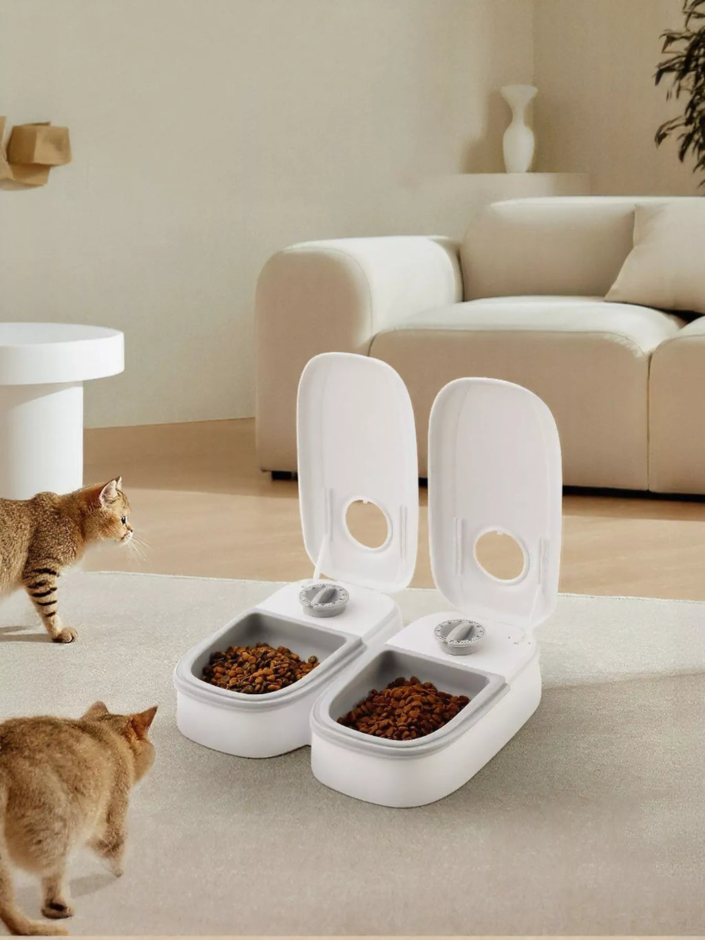 Automatic pet feeder with portion control from Trendsi, showing a sleek black device with multiple food compartments for cats or dogs.