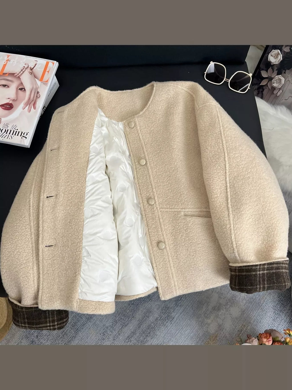 Off-white padded button-up jacket with plaid cuffs