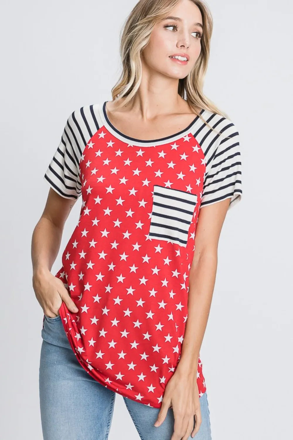Plus size Heimish Star and Stripe round neck short sleeve T-shirt by Trendsi, featuring a star and stripe pattern on soft fabric.