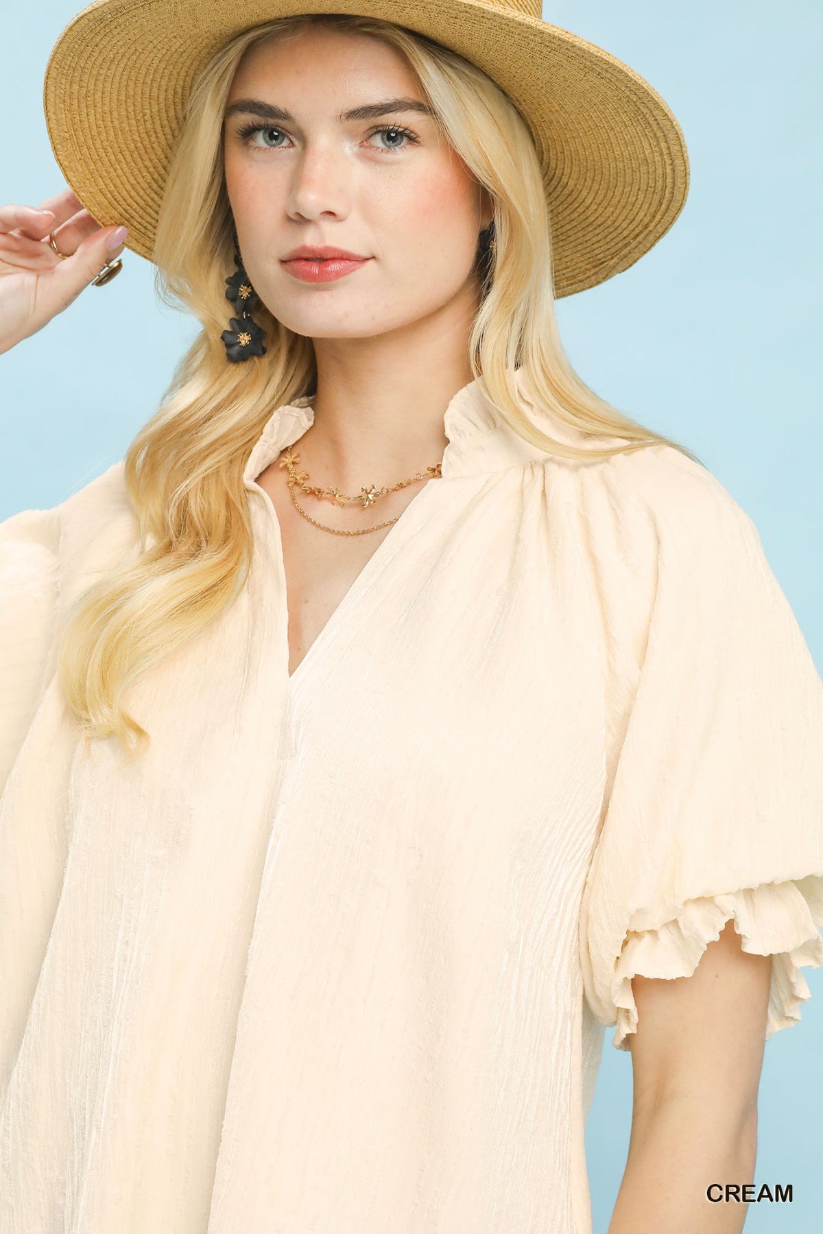 Umgee linen blend ruffle dress featuring a flowy design, soft fabric, and feminine ruffle details, perfect for casual summer wear.