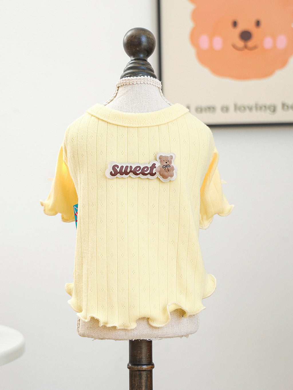 Ribbed pet top with sweet bear patch from Trendsi, featuring a cozy, striped design for pets.
