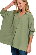 Zenana Airflow Collar Tee with smocked sleeve band, featuring a relaxed fit and soft fabric, shown on a model.