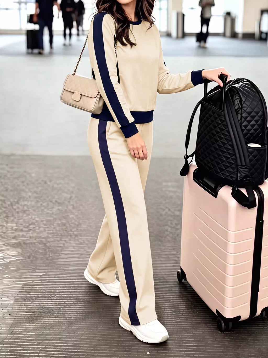 Contrast side stripes top and pants set by Trendsi, featuring a stylish matching long sleeve shirt and pants with bold stripe details.