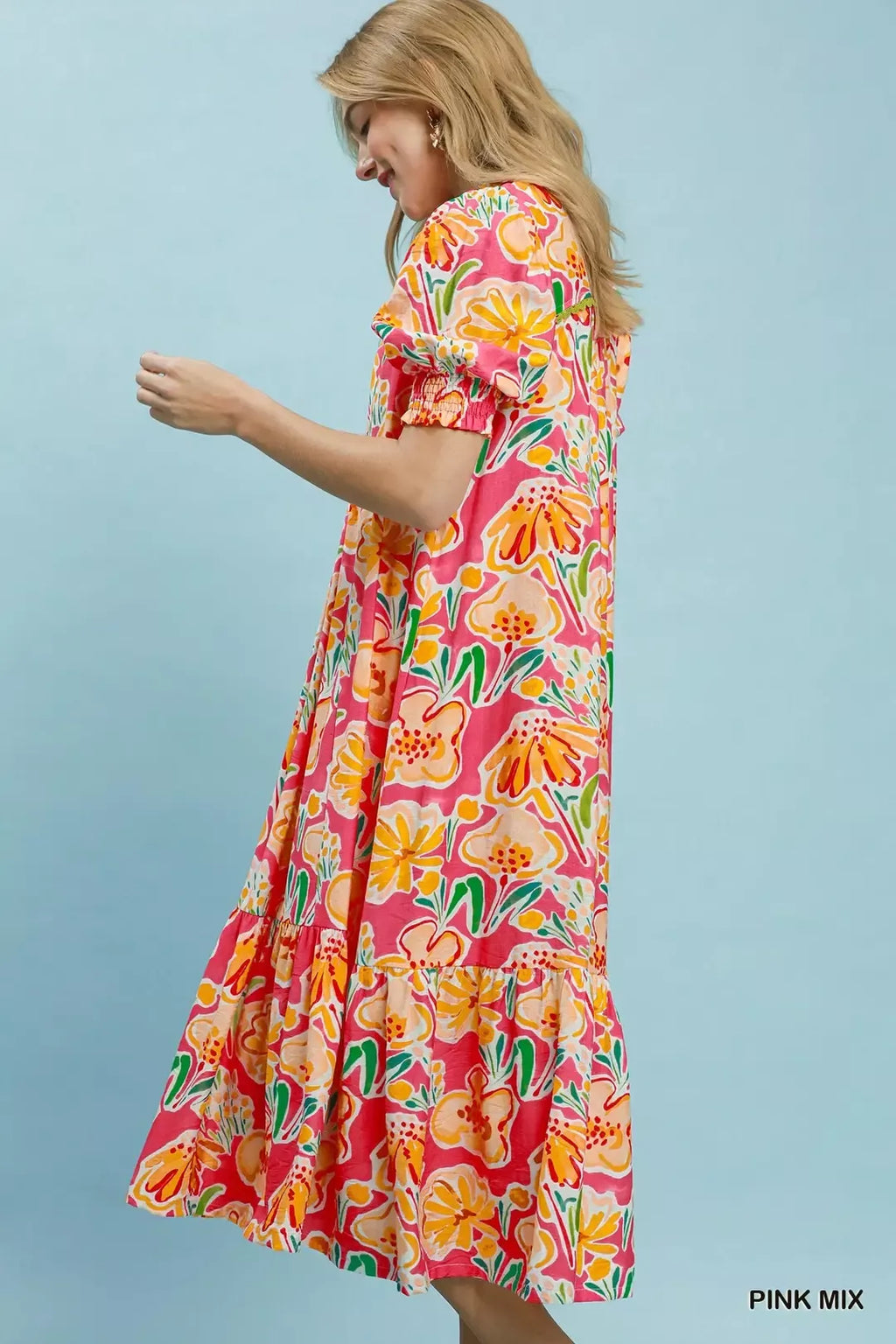 Umgee floral print puff sleeve tiered midi dress with ruffled details and a flowy silhouette, perfect for spring and summer occasions.