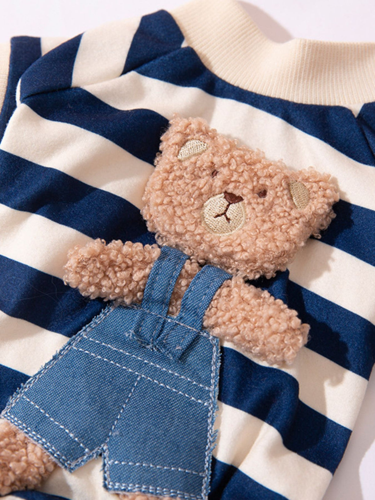 Printed pet jumpsuit from Trendsi featuring colorful patterns and comfortable fabric, perfect for stylish pets.