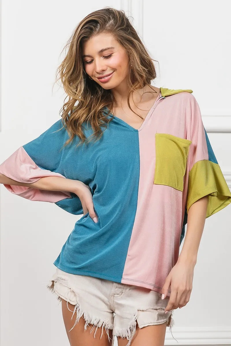 Color block BiBi Slinky Knit V-neck front top by Trendsi featuring a fitted design and vibrant multicolor pattern.
