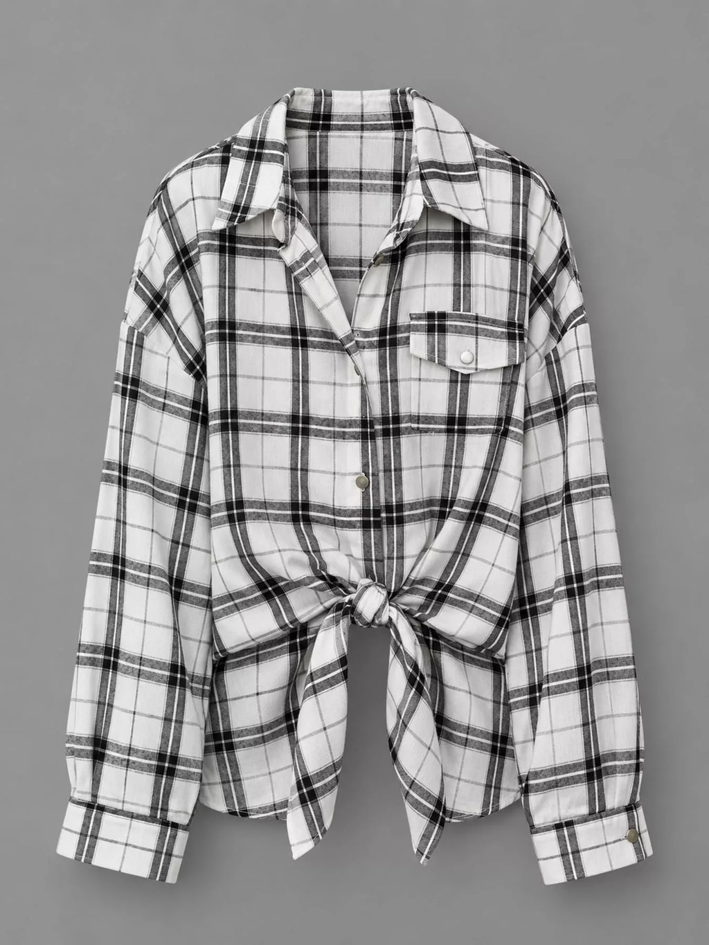 Trendsi plaid button-up shirt featuring a classic checkered pattern in red, black, and white, with a collar and button front.