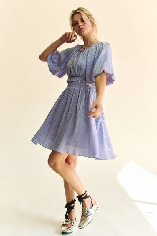 Davi & Dani back button puff sleeve mini dress in black with a fitted silhouette and stylish puff sleeves.