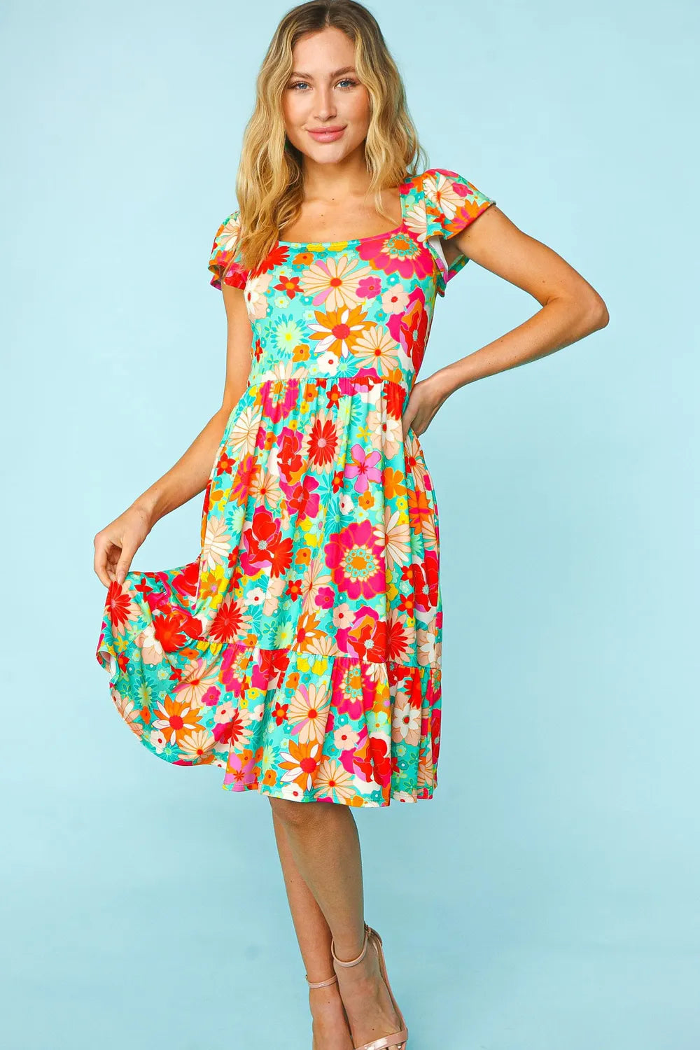 Haptics Floral Square Neck Short Sleeve Dress by Trendsi featuring a vibrant floral pattern and a stylish square neckline.