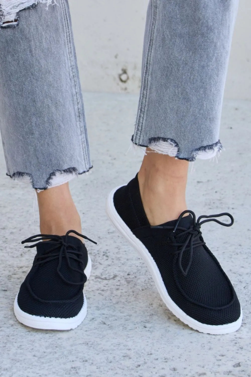 Forever Link flat round toe lace-up sneakers by Trendsi, featuring a sleek design and white mesh upper with white laces.