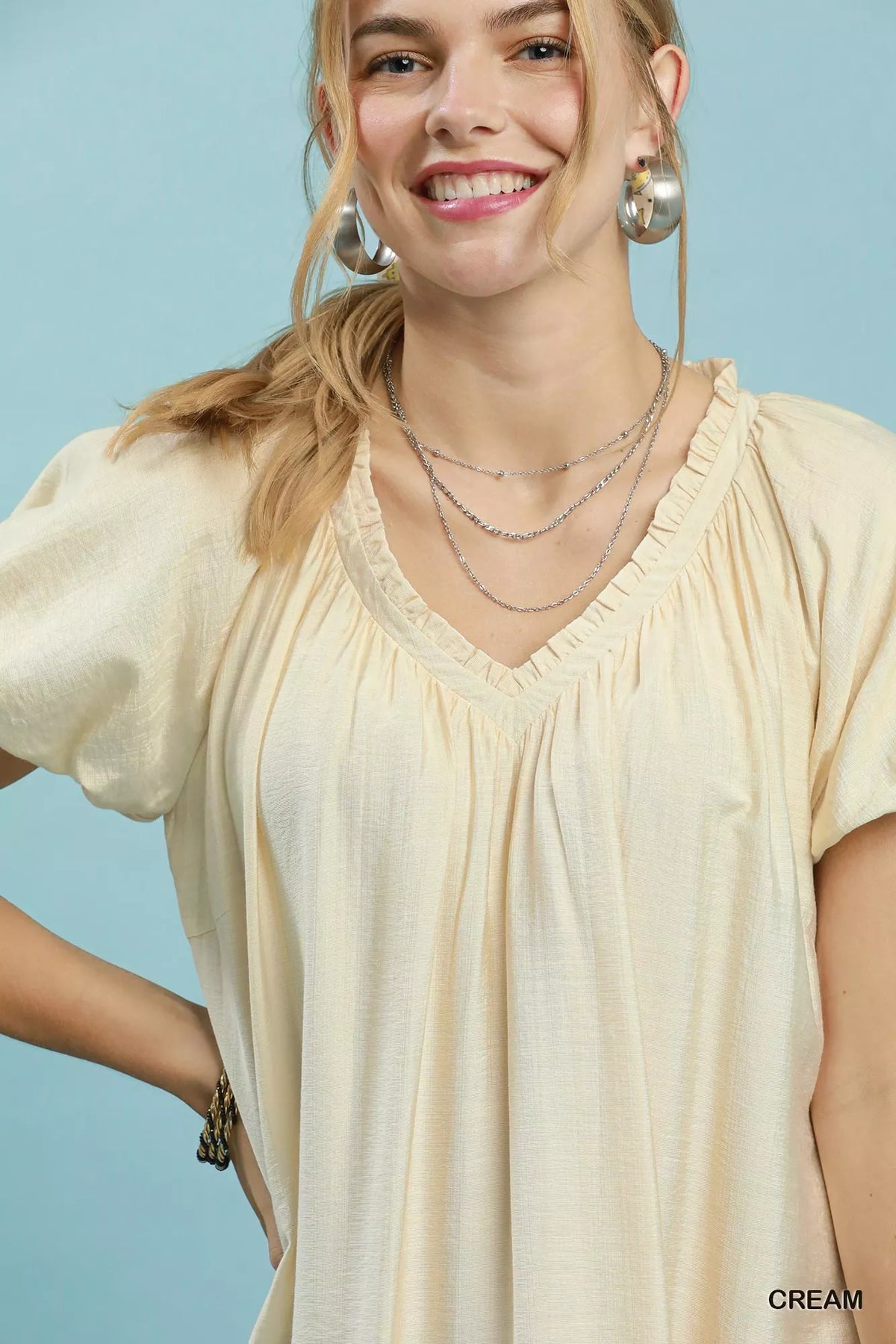 Umgee ruffle hem shift mini dress in soft fabric, featuring a stylish ruffled hem and a relaxed fit, perfect for casual wear.