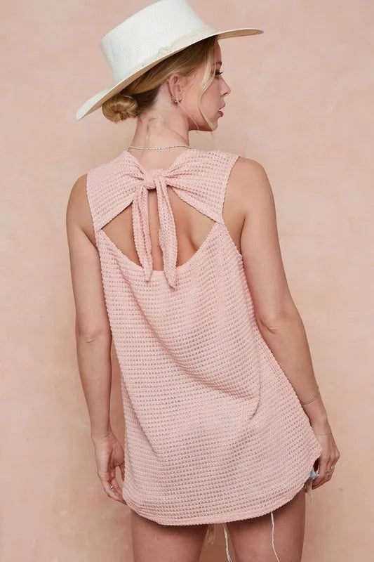 Trendsi BiBi Popcorn Waffle open-back top with tied ribbon, featuring a stylish waffle fabric and fashionable open-back design.