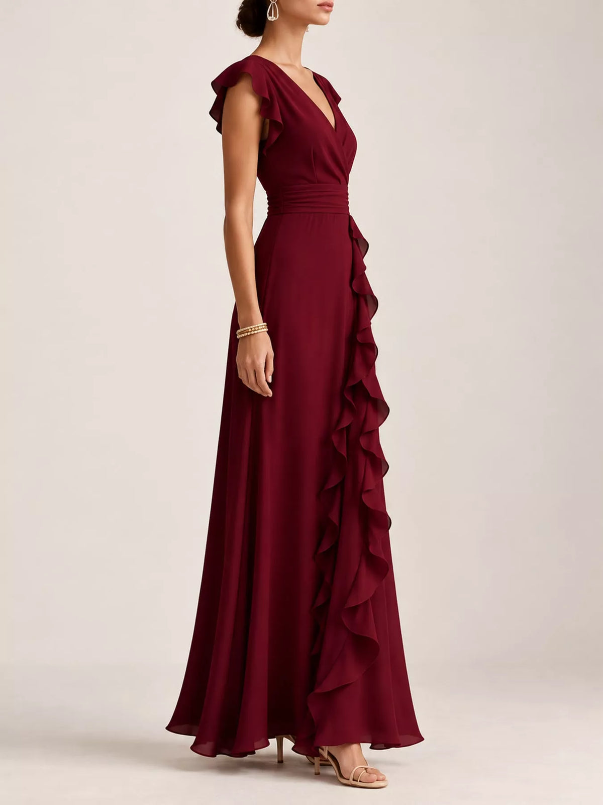 Ruffled surplice sleeveless maxi dress by Trendsi featuring flowy fabric and a feminine ruffled neckline.