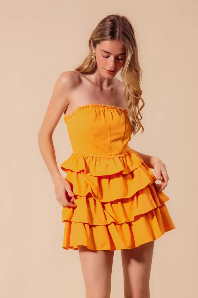 Trendsi SO ME strapless ruffle layered cheer up dress featuring a playful, layered design perfect for game day or festive occasions.