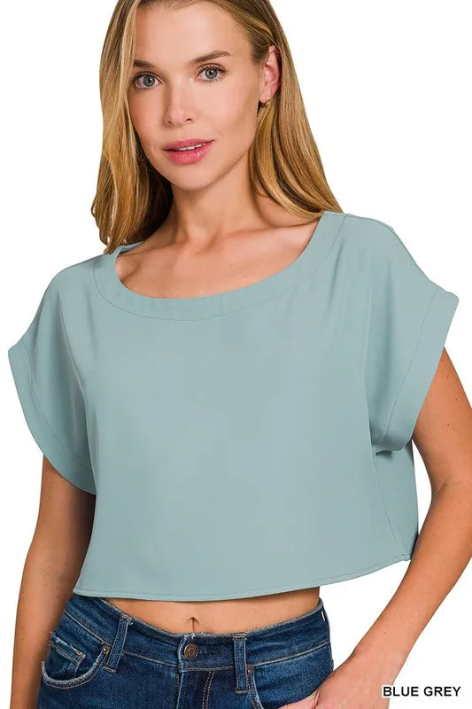 Heavy woven crop tee and skirt set by Trendsi, featuring a stylish span crop top and matching skirt in a woven fabric.