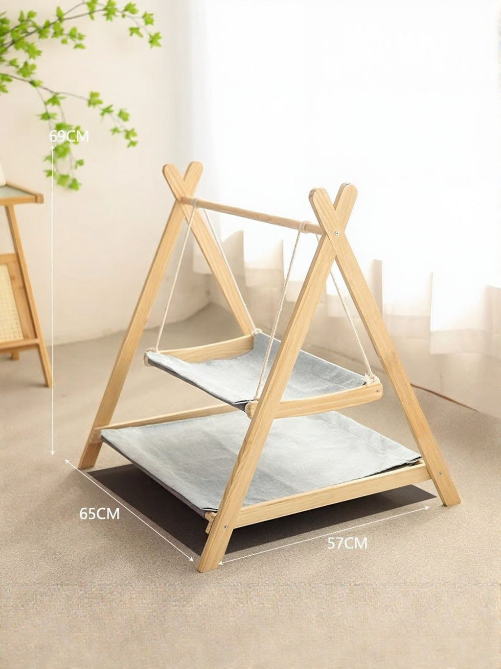 Wooden triangle cat hammock by Trendsi with soft fabric surface, designed for comfortable cat lounging and play.