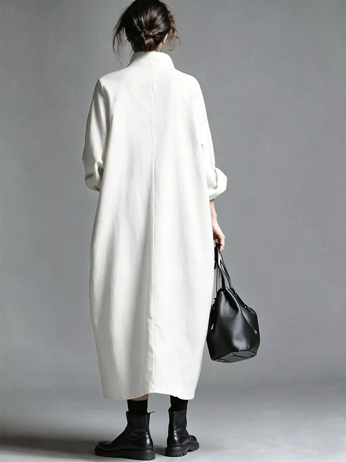 Plus size loose-fit mock neck midi dress with pockets by Trendsi, featuring a full size, stylish and comfortable design.