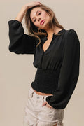 Trendsi BiBi smoking waist band deep V-neck top with puff sleeves, stylish and fitted fashion top for women.