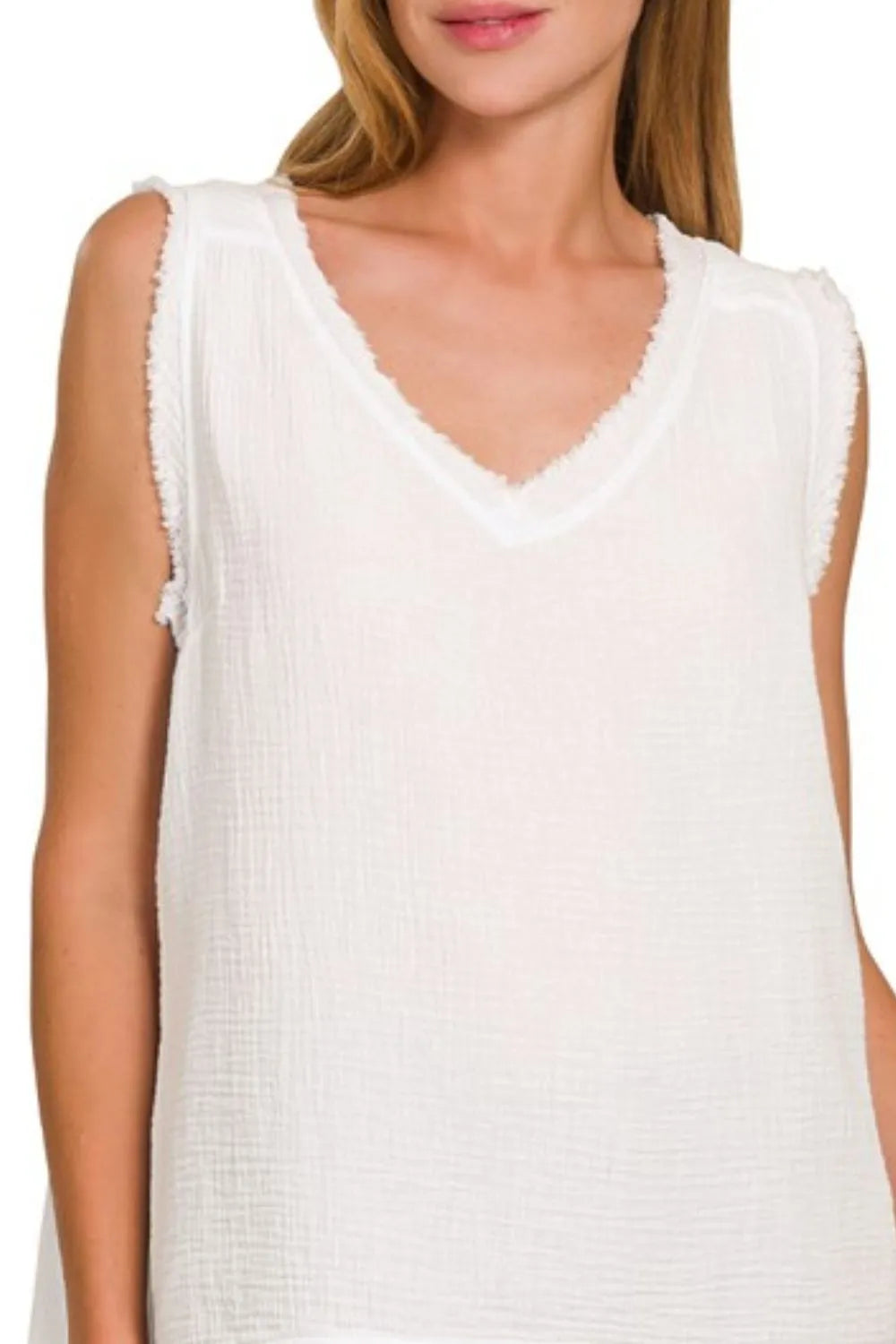 Zenana double gauze raw edge V-neck tank top with sleeveless design and relaxed fit, shown in natural fabric and style.