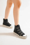 Beast Fashion multi-buckle straps studded platform sneakers with bold design and chunky soles, styled with black laces.