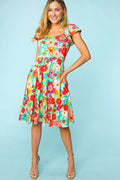 Haptics Floral Square Neck Short Sleeve Dress with a fitted bodice and vibrant floral pattern, perfect for summer wear.