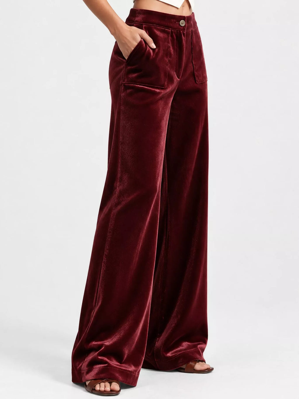Plus size high-waisted velvet pants with wide legs and pockets, stylish Trendsi full-size fashion pants in a rich velvet fabric.