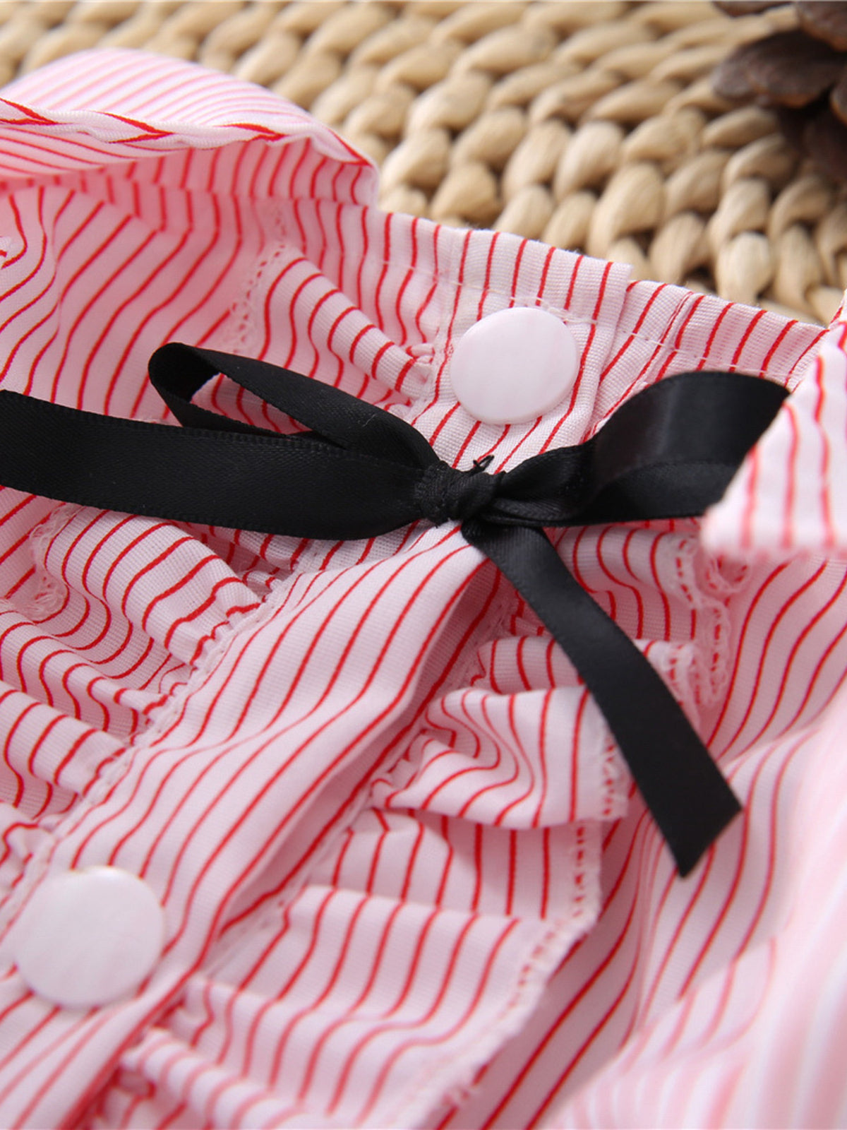 Striped ruffle pet top with bow from Trendsi, featuring a cute design and playful ruffle details for small dogs or cats.