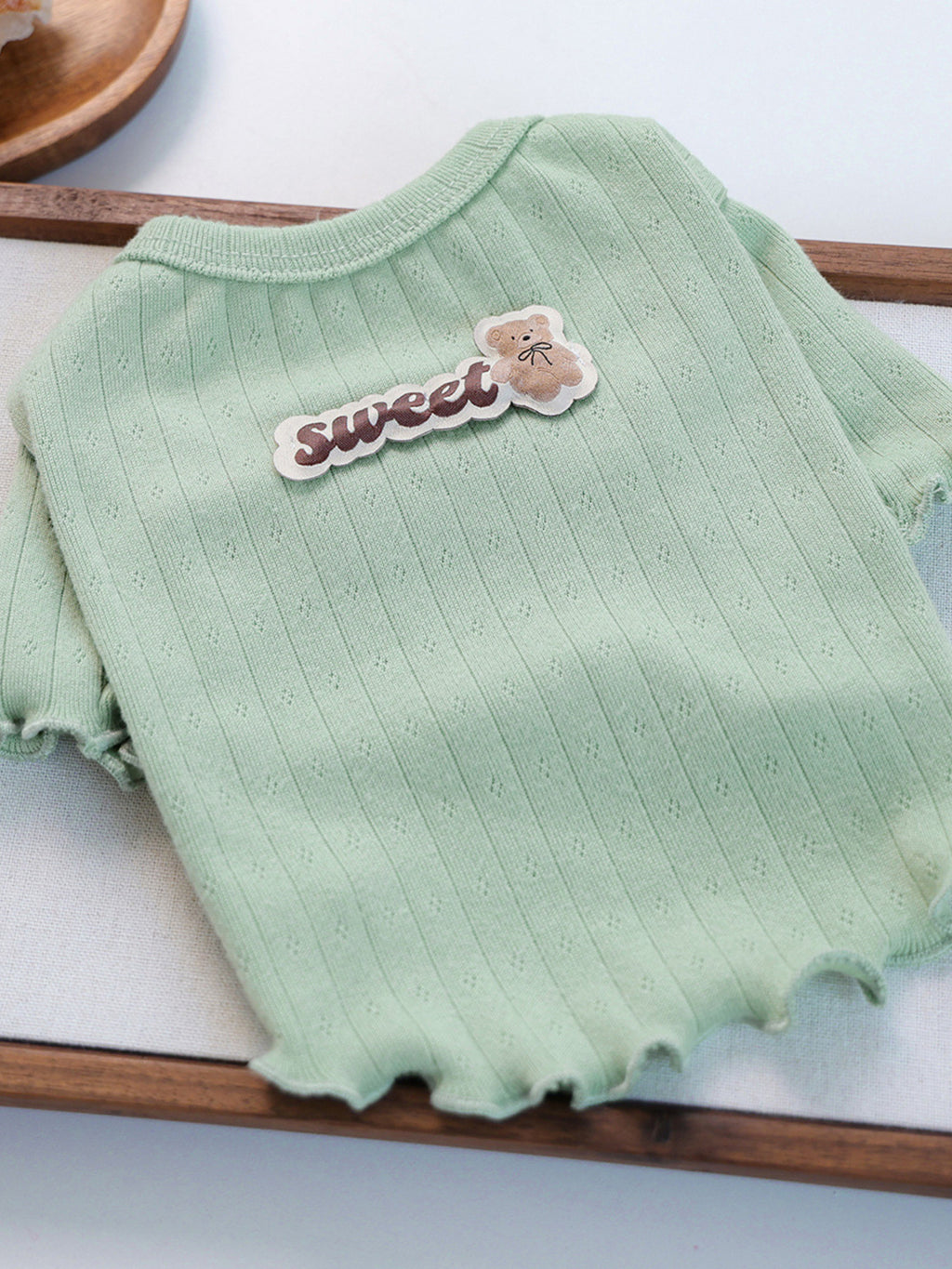 Ribbed pet top with sweet bear patch from Trendsi, featuring a cozy fit for small dogs or cats, in soft fabric.