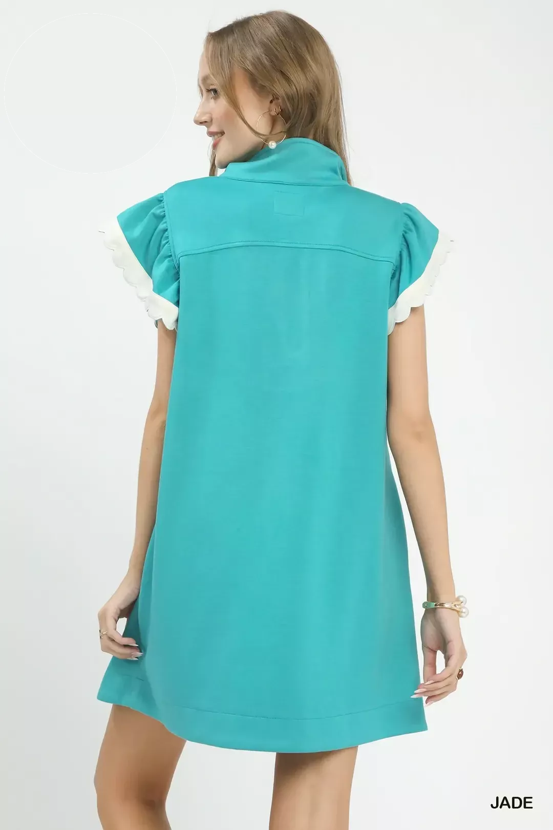 Umgee zip-neck flutter sleeve dress in soft fabric, featuring a relaxed fit and stylish design, perfect for casual wear.