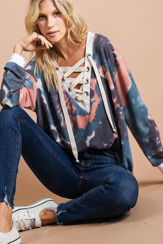 BiBi Tie Dye Deep V-Neck Top with Lace Up Front, vibrant colors, and trendy casual style, designed by Trendsi.