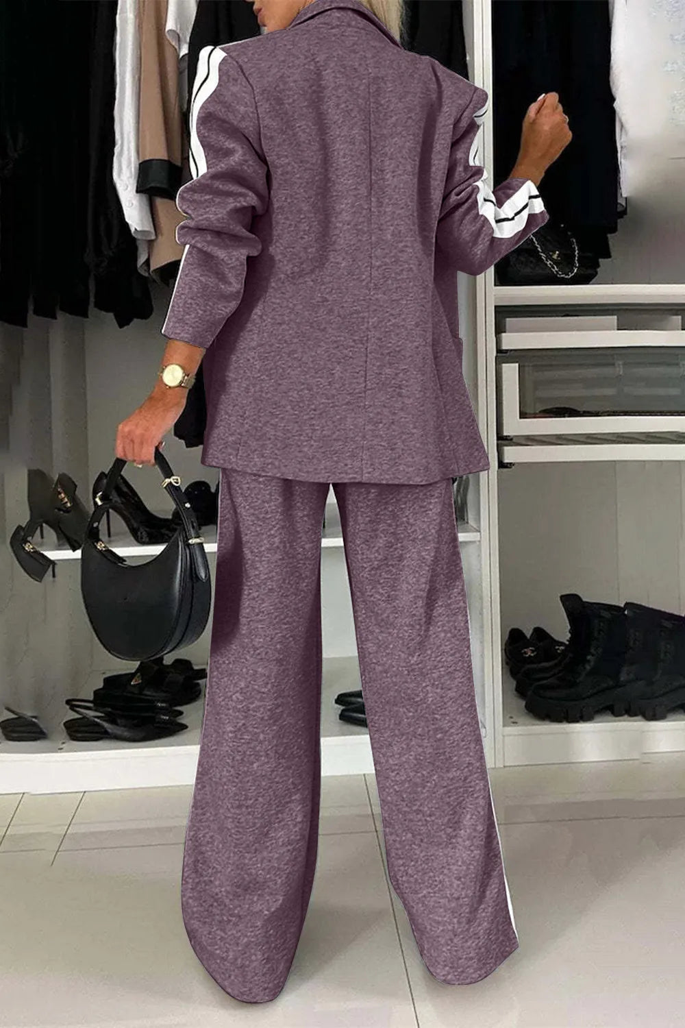 Full size contrast lapel collar top and pants set by Trendsi, featuring a stylish coordinated outfit with a tailored lapel collar.