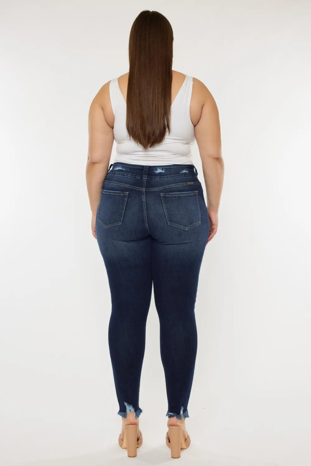 Kancan high waist jeans with raw hem and whisker details, featuring a full size fit, styled by Trendsi.