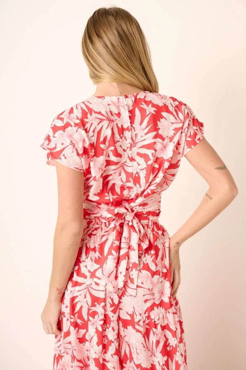 Tropical print top and skirt set by Trendsi featuring vibrant, colorful patterns perfect for summer wear.