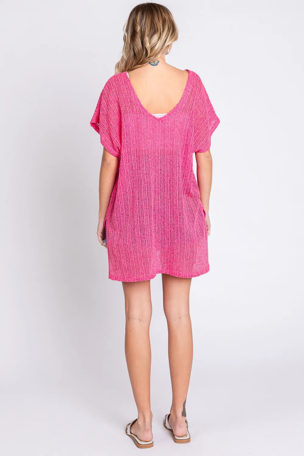 GeeGee short sleeve knit cover-up dress with side slits, featuring a lightweight, breathable fabric and relaxed fit.
