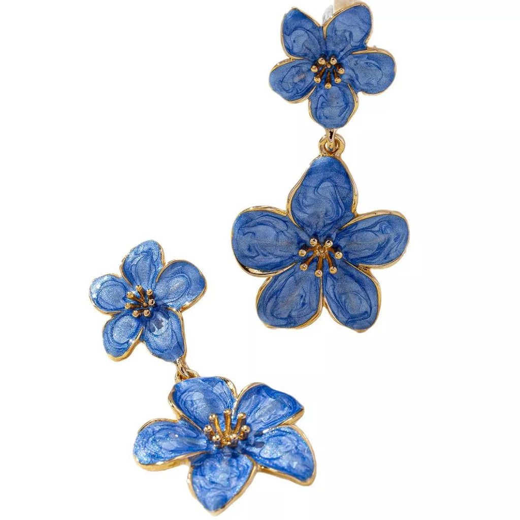 Flower dangle earrings by Trendsi featuring delicate floral design and gold-tone hooks, perfect for adding a feminine touch.