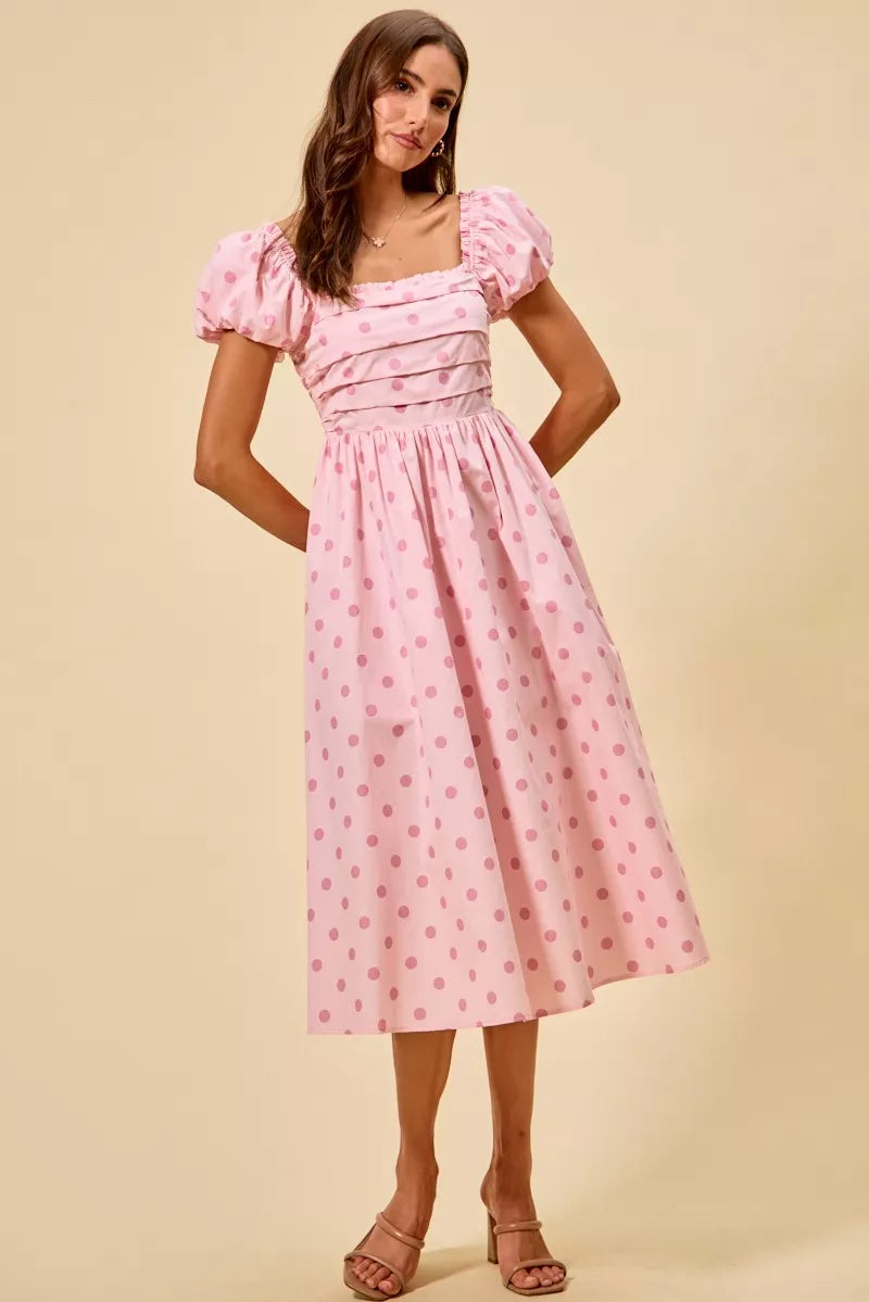 Polka cotton print short sleeves midi dress by Trendsi featuring a stylish all-over polka dot pattern and a flattering midi length.