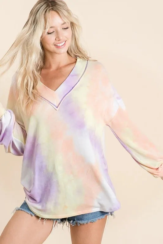 Pink and purple tie-dye French terry V-neck top with puff sleeves, casual and stylish for trendy everyday wear