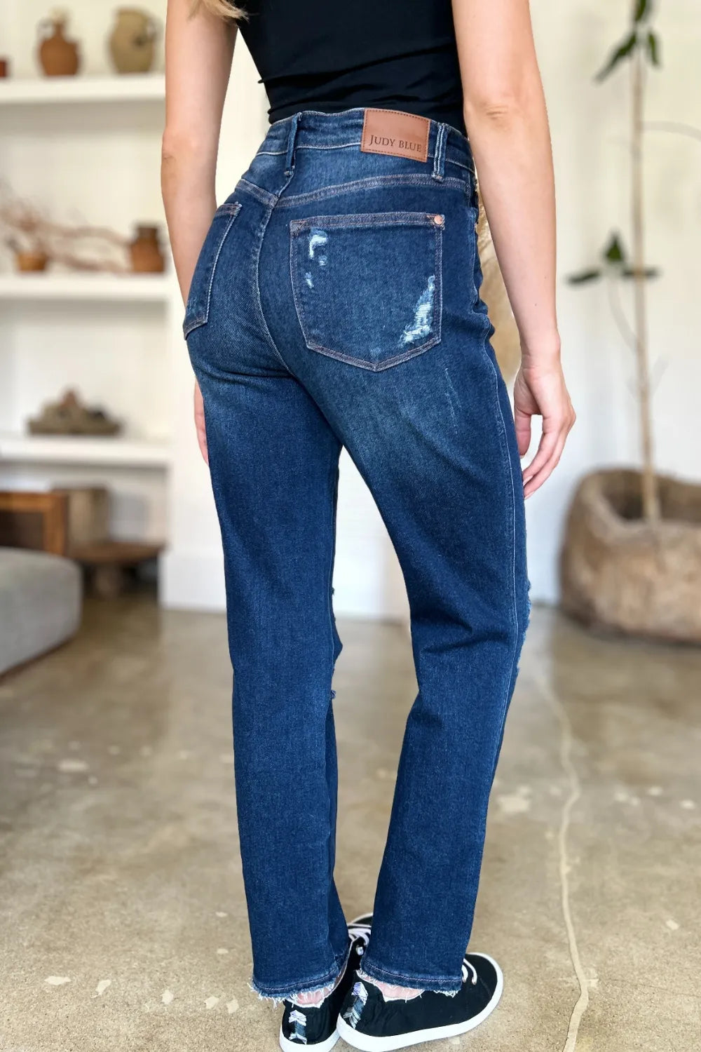 Judy Blue high waist rigid straight jeans with heavy destroy details, dark wash, and classic fit, styled on a model.