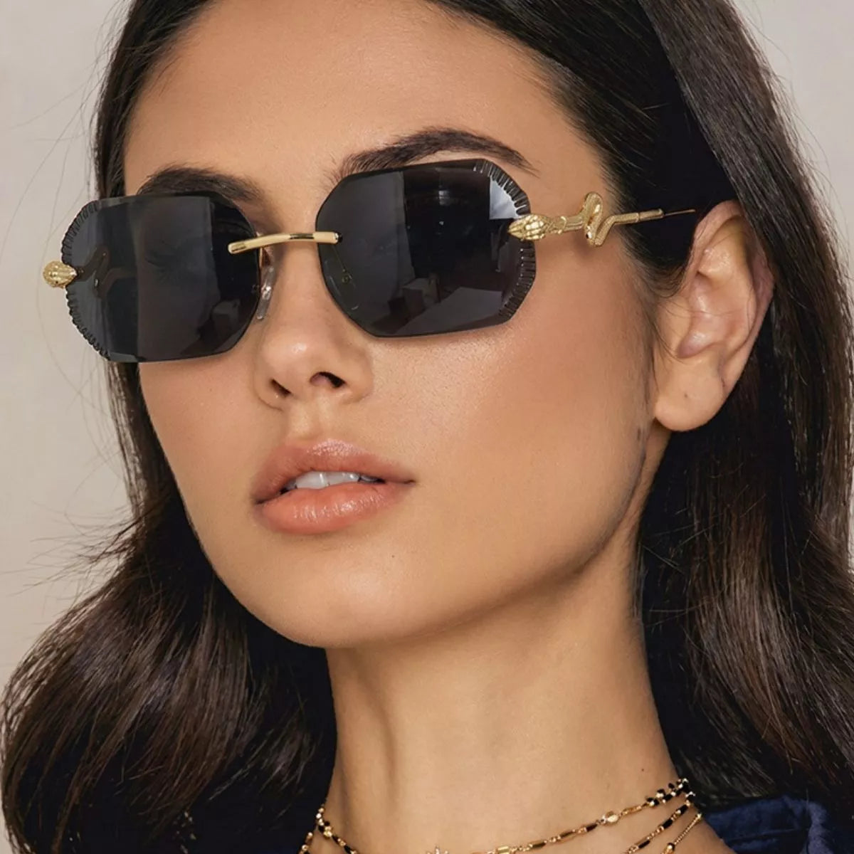 Rimless UV protective sunglasses from Trendsi with sleek design, clear lenses, and lightweight frame for stylish sun protection.