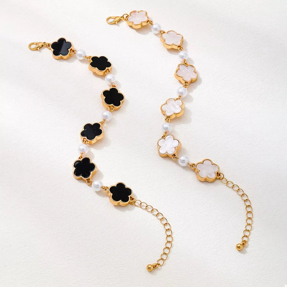 18k gold-plated alloy flower bracelet featuring intricate floral design and delicate chain, showcasing elegant jewelry style.