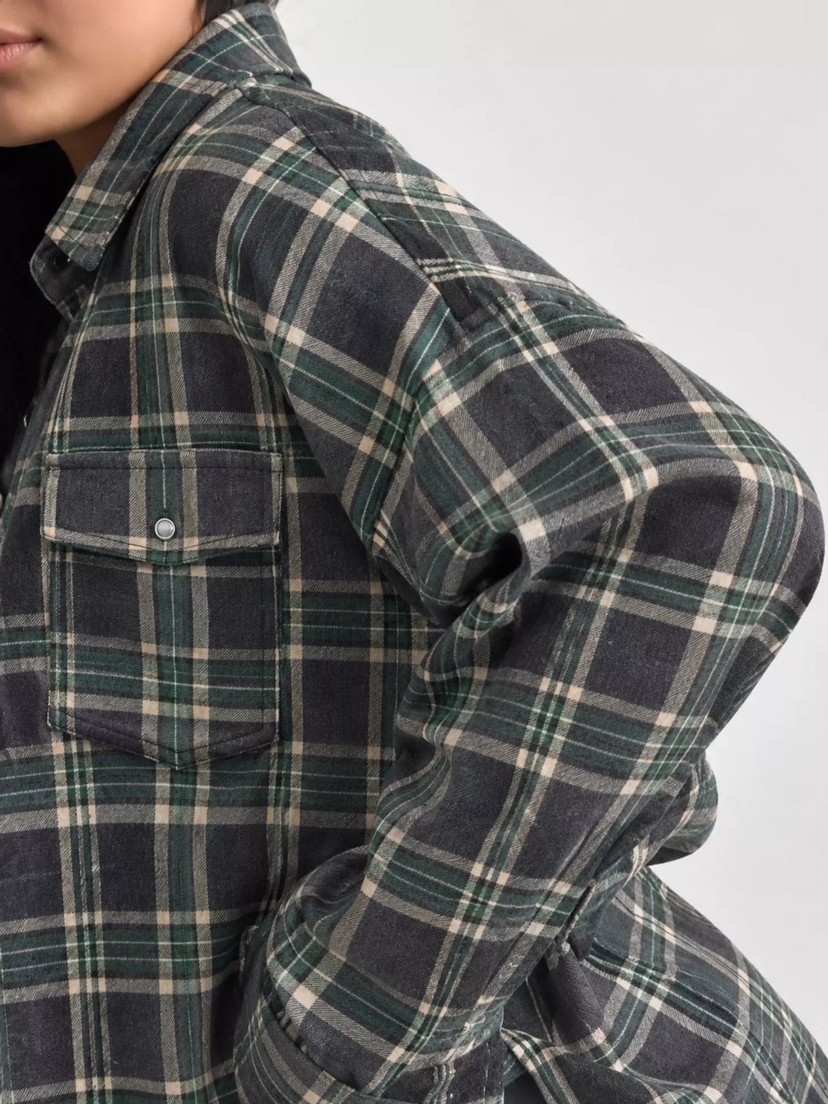 Trendsi plaid button-up shirt featuring a classic checkered pattern, long sleeves, and a collared design.