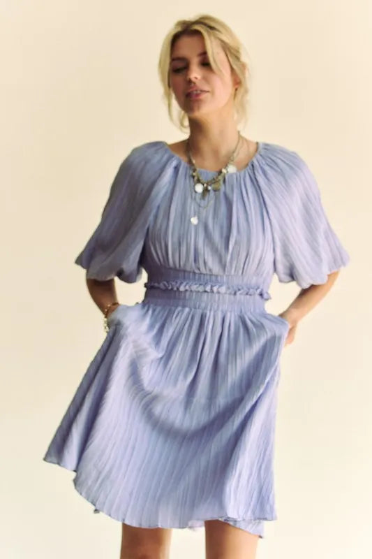 Davi & Dani back button puff sleeve mini dress in white with a fitted silhouette and stylish puffed sleeves.